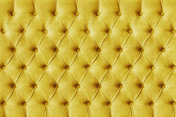 istock Yellow capitone velours textile decoration with buttons 1405128396