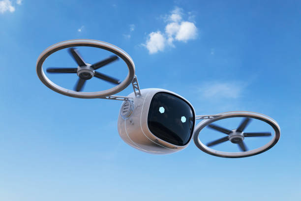 Surveillance robot or drone flying in blue sky stock photo