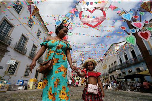 salvador, bahia, brazil - june 24, 2022: child with typical redneck clothes during Sao Joao party in Pelourinho Historic Center of the city of Salvador.