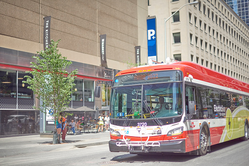 Toronto Ontario, Canada- June 25th, 2022: An exterior of a TTC bus during Toronto’s annual Dyke March.