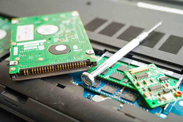 istock Repairing and upgrade circuit mainboard of notebook, electronic, computer hardware and technology concept. 1405140898