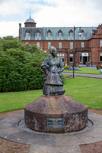 Crichton Campus, Dumfries, Scotland, United Kingdom - May 4, 2022: Bronze statue of Elizabeth Crichton, philanthropist and founder of the Crichton Royal Hospital in Dumfries. The statue was created by sculptor Bill Scott, and unveiled in 2000 by Prince Charles, the Duke of Rothesay.