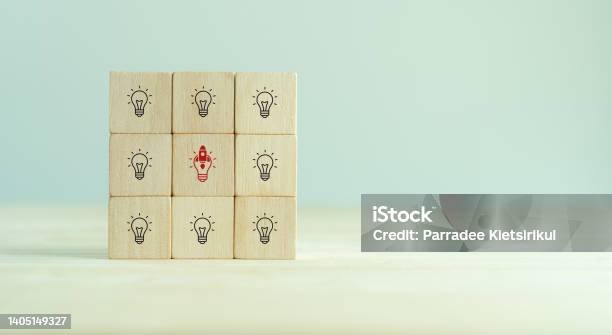 Launching Idea Startup Business Concept Beyond Competitors Good Plan Successful Goal Concept Wooden Cubes With Rocket Launch And Other Icon On Grey Background And Copy Space Innovation Banner Stock Photo - Download Image Now