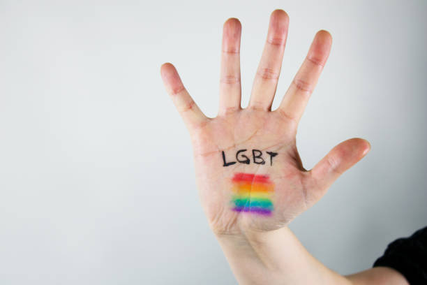 istock hand with lgbt community flag 1405152534