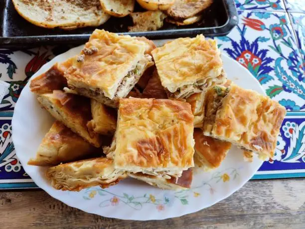 Traditional turkish baked borek serving with minced beef meat at Istanbul turkey