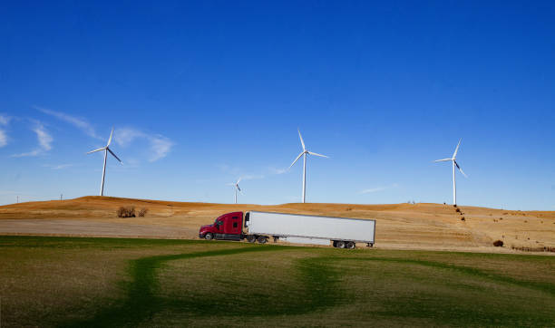 istock Road trip with wind farm power plant, Highway 1405169805