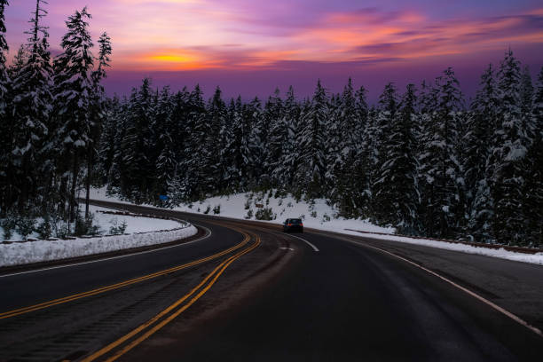 istock White Snow road trees drive, Road to wintry sunset 1405171555