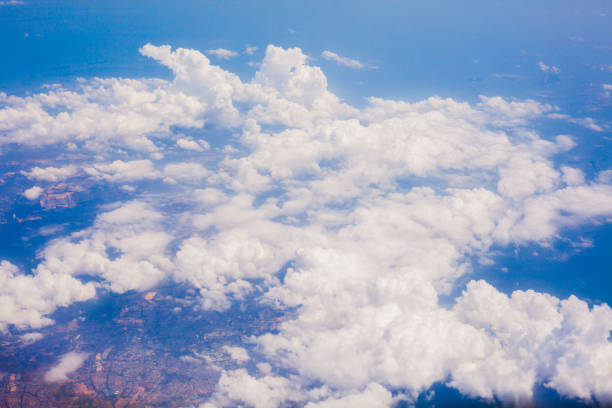 istock Top view from fly, aerial view of clouds and sky 1405173234