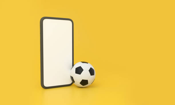istock Watching soccer on a smartphone on yellow background. Betting online concept. 3d rendering. 1405175689