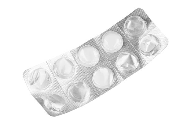 Empty pack of pills isolated on white background. stock photo