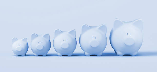 istock Piggy banks lined up bigger and bigger. Copy space. 3D illustration. 1405179837