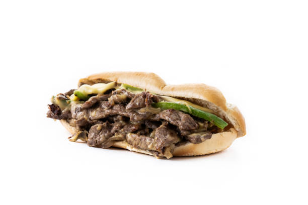 Whole philly cheese steak with melting cheese on a white background with message area at top  or bottom of frame