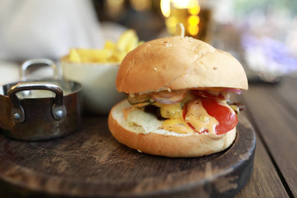 Burger on wooden board in a restaurant