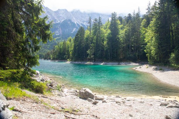 Lake in the forest with mountains, Eibsee, Germany stock photo