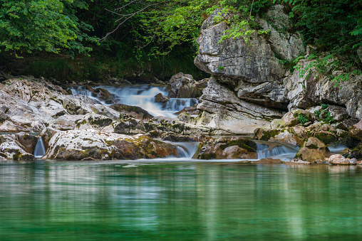 Dobra River on its arrival at the Olla de San Vicente, a pool of emerald green waters, in the council of Amieva, Asturias.