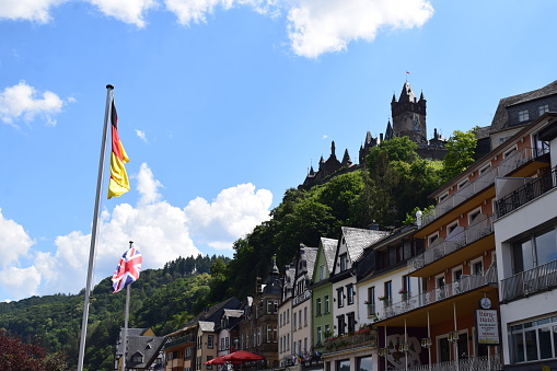 Cochem, Germany - 06/23/2022: Mosel waterfront with the castle above