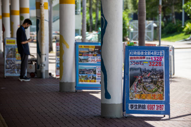 Hong Kong - June 26, 2022 : Real estate advertisements on street in Hung Hom, Kowloon, Hong Kong.