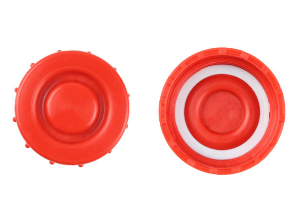 Two sides of big plastic canister cap isolated on white background