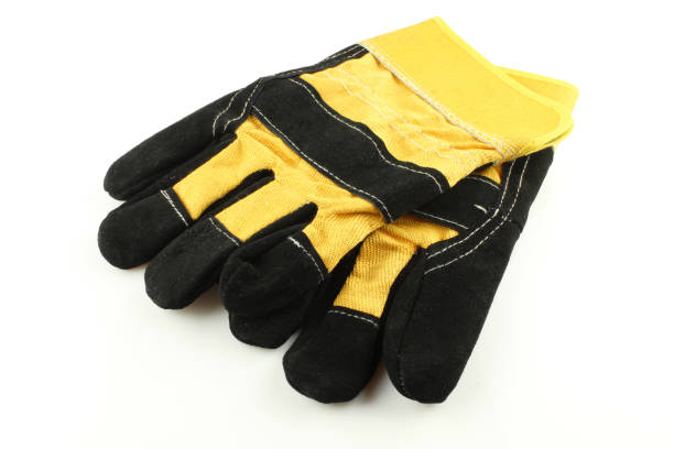 istock Black and yellow working gloves isolated on white background. Safety work wear 1405192421