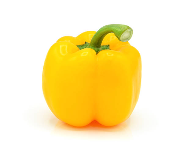 istock Whole yellow bell pepper isolated on white 1405192629