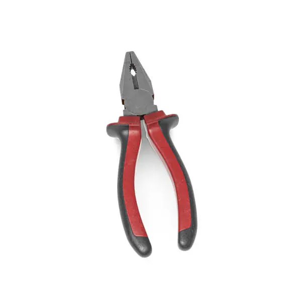 Photo of Metal hand pliers with red and black rubber handless isolated on white background