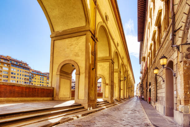 istock Ponte Vecchio Bridge during Beautiful Sunny Day with Reflection in Arno River, Florence 1405198197
