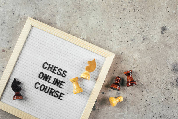 istock Flat lay of letters board with text Chess Online Course. 1405198241