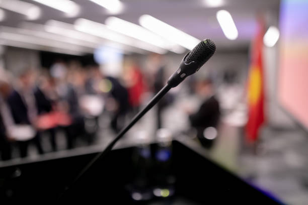 istock Microphone in the room for press conference. News and information . 1405199318