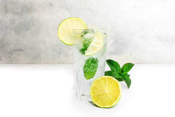 istock Mojito summer refreshing cocktail with ice, lime and mint 1405199649