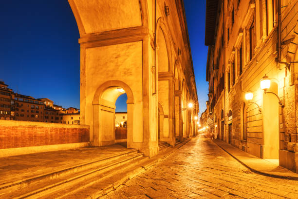 istock Illuminated Ponte Vecchio Bridge with Reflection in Arno River at Dusk, Florence 1405200734