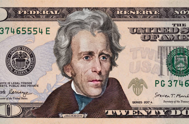 istock Closeup of front side of colorized 20 dollar banknote 1405200995