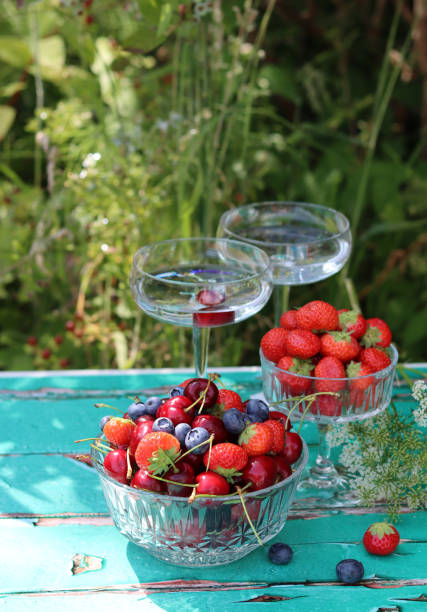 istock Picnic in the garden. Still life with berries. 1405201257