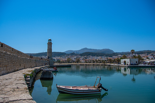 The lighthouse of Rethymno in the old Venetian port, Greece