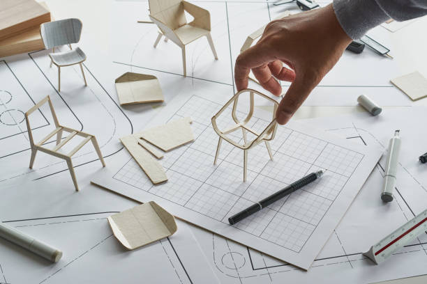 istock Designer sketching drawing design development product plan draft chair armchair Wingback Interior furniture prototype manufacturing production. designer studio concept . 1405201602