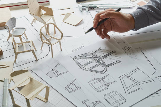 istock Designer sketching drawing design development product plan draft chair armchair Wingback Interior furniture prototype manufacturing production. designer studio concept . 1405201605