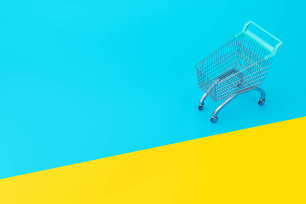 top view of empty shopping cart on color background 3d illustration stock photo