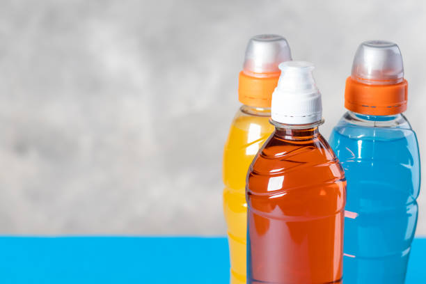 istock Blue, yellow and orange isotonic drinks. With copyspace 1405203866
