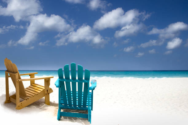 istock Two wooden beach chairs on Caribbean coast 1405206508
