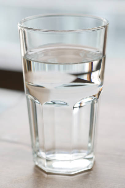 istock a glass of water on table close up 1405207719
