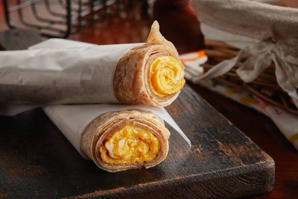 istock egg cheese chapati omelet roll served in a dish isolated on wooden background side view 1405210056