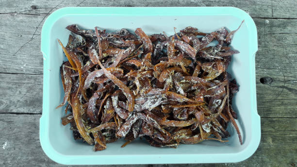 istock mini beltfish or ikan layur, fried by salting process 1405210388