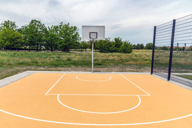 istock empty public basketball court 1405212219