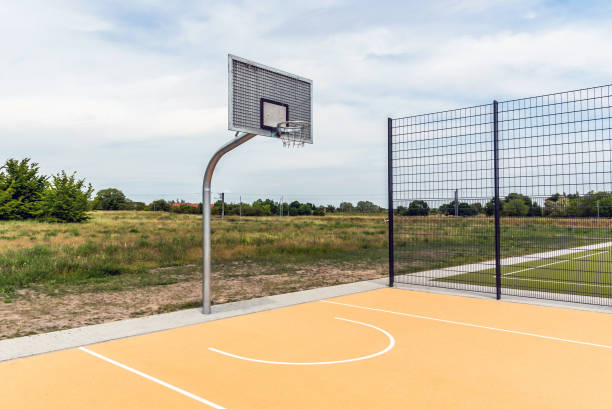 istock empty public basketball court 1405213057
