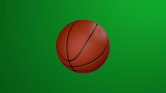 Classic basketball ball on green background. Chroma key. 3d render.