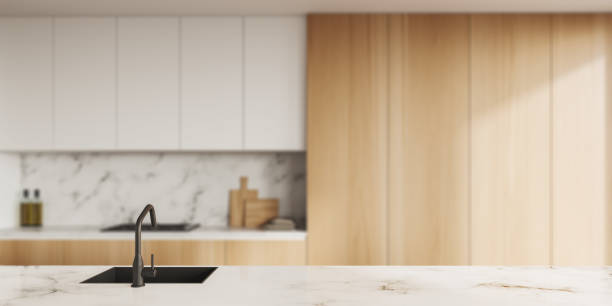 istock Light island on background of marble kitchen interior. Mockup 1405216312
