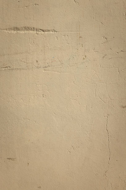 istock Part of a textured beige concrete wall 1405219871