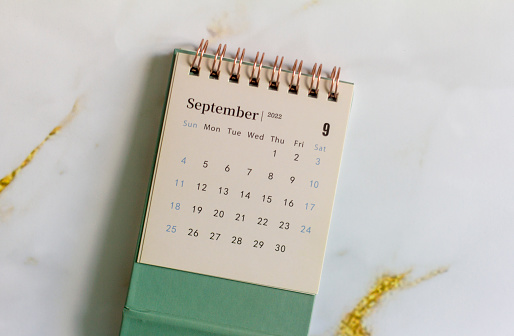 Calendar for September 2022 on a light abstract background