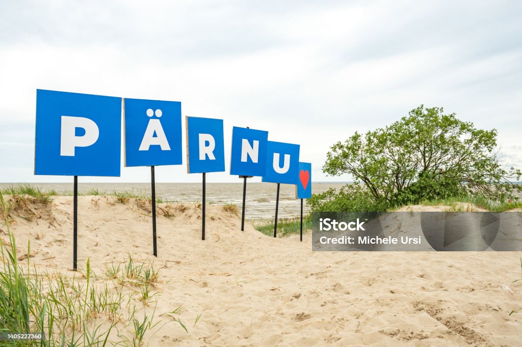 Parnu, Estonia Europe, name of the city on the sandy beach Parnu, Estonia Europe, name of the city on the sandy beach and dunes with heart Architecture Stock Photo