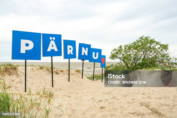 Parnu Estonia Europe Name Of The City On The Sandy Beach Stock Photo - Download Image Now