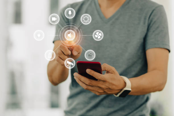 istock A man controls smart home automation with his smartphone 1405228634